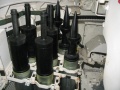 120px-In_front_of_the_loader's_position,_to_the_left_of_the_main_gun,_is_a_nineteen-round_ready_rack._This_tank_is_fitted_out_with_replica_HEAT_and_sabot_ammunition..jpg