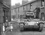 Mk 2 Matilda Tank being driven through Vulcan Village to the testing ground.jpg