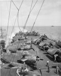 Aircraft_on_flight_deck_of_USS_Bataan-1944.jpg