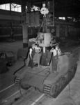 Workers assembling a Sexton self-propelled gun at the Montreal Locomotive Works, Montréal, Québec, Canada, August 1944..jpg