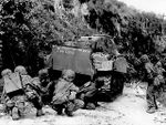Marines_take_cover_behind_medium_tank.jpg