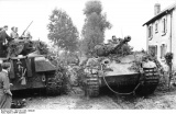 Panther tanks camouflaged in a French village, Summer 1944