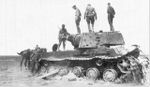 160px-German_soldiers_examining_hit_KV-1_tank_(with_extra_armor)._Leningrad's_Front,_September_1941.jpg