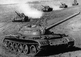 A_column_of_five_T-54-2_tanks.jpg