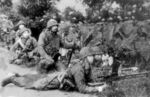 IJN_paratroopers,_attacking_Dutch_troops_at_Longoan_airfield,_January_1942.jpg