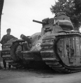 Abandoned Char B1 tank, France, 1940; note German Panzer II in background
