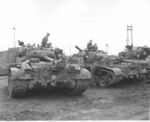 Pershing and Sherman tanks of the 73rd Heavy Tank Battalion at the Pusan Docks, Korea..jpg
