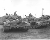 Pershing and Sherman tanks of the 73rd Heavy Tank Battalion at the Pusan Docks, Korea