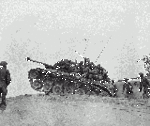 160px-Men_of_the_9th_Infantry_Regiment_man_an_M-26_tank_to_await_an_enemy_attempt_to_cross_the_Naktong_River..gif