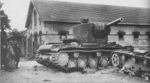Captured_KV-2_left_in_tank_park_of_one_of_the_Soviet_units._At_the_right_side_one_can_see_KhT-26_flame_thrower_tank,_Ukraine,_June_1941_.jpg