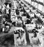 Sexton SP's and Sherman tanks being built side by side in a Canadian factory. All Sherman tanks are single cast hulls..jpg