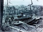 270px-M4A3E8_tank_stuck_on_a_provisional_bridges_during_the_fighting_on_the_German_city_Grossbliederstroff_in_Saarland._Tank_is_in_a_state_of_749th_Tank_Battalion._18th_február_1945th_.jpg