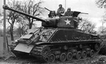 M4A3 76 mm Medium Tank in Europe in early 1945. Has add on armor kit and an additional 30 cal MG above the loader's hatch.png