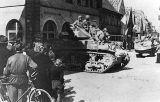 M5 Light Tank with the 7th US Army entering Neustadt a.d. Aisch, Germany on April 6, 1945