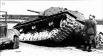 320px-German_officers_are_examining_the_damaged_Soviet_KV-1_heavy_tank_screened_with_additional_armor_It_probably_belonged_to_the_101st_Tank_Division._Western_Front,_executive.jpg