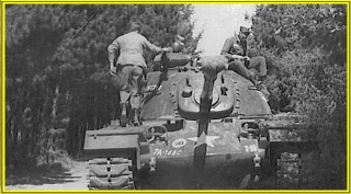 M-48_Tank_on_maneuvers._I_Co.,_1st_Plt..jpg