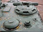 Su122-54 commanders hatch and a vent duct.jpg